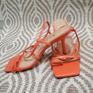 Orange strappy heels from shein, slightly dented infront .
